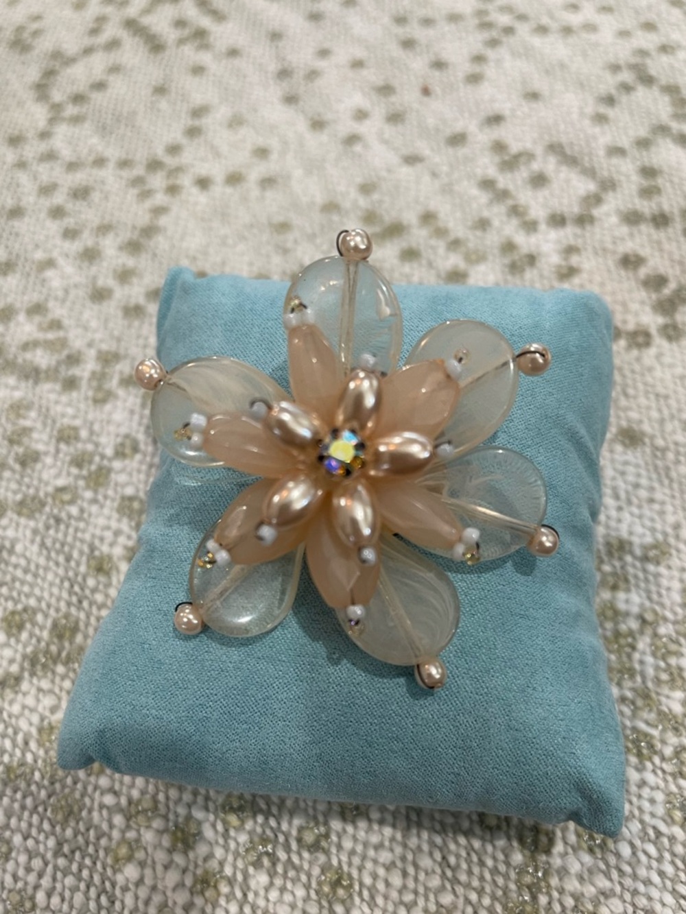 Elegant Floral Crystal Brooch in Champagne and Ivory